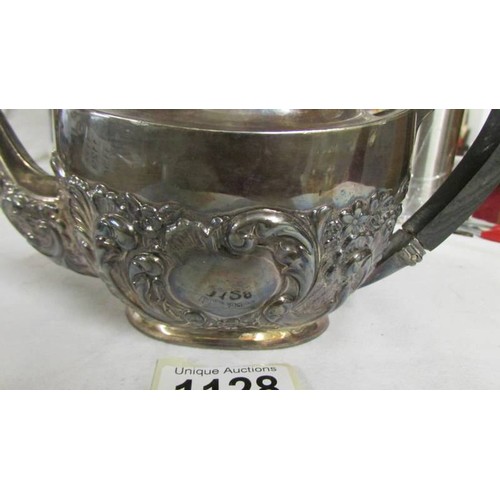 1128 - A decorative silver teapot, approximately 330 grams.