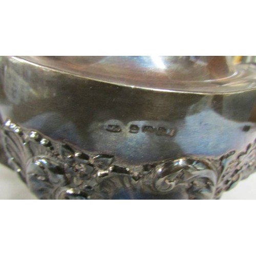 1128 - A decorative silver teapot, approximately 330 grams.