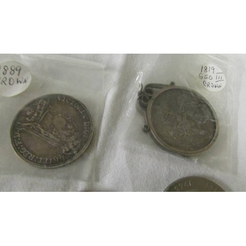 1130 - An 1819 silver crown, an 1880 silver crown, an 1887 coin and a Churchill crown.