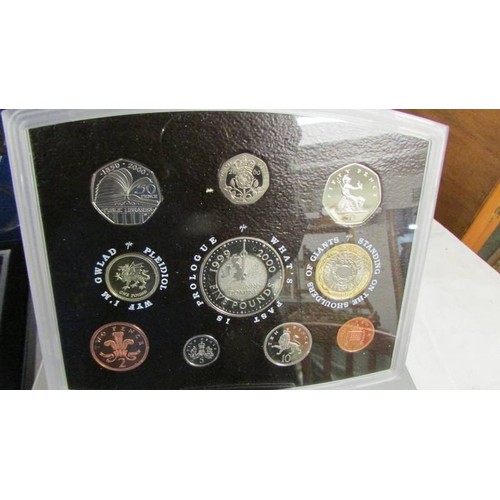 1131 - A 2005 UK Battle of Trafalgaar Nelson proof set and a year 2000 executive proof coin collection.