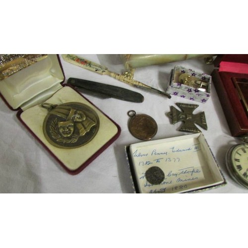 1135 - An Onyx jewellery box with cuff links, badges, medallions etc.,