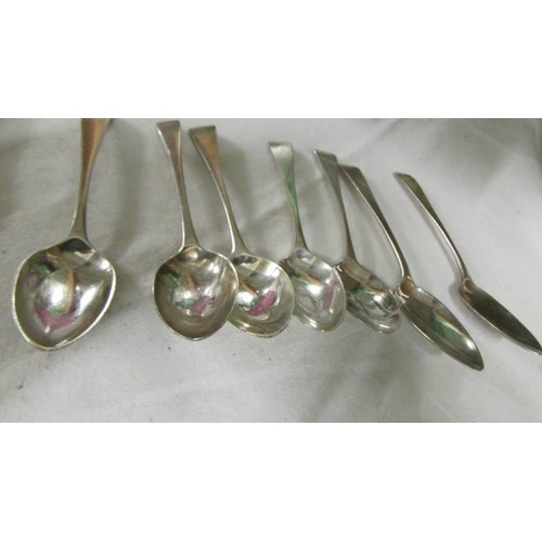 1143 - Seven silver spoons and a silver butter knife. 125 grams.