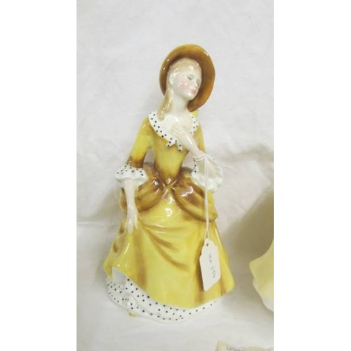 1159 - Two Royal Doulton figurines, Pretty Ladies 'Autumn' HN 5323 and Sandrs HN2275.