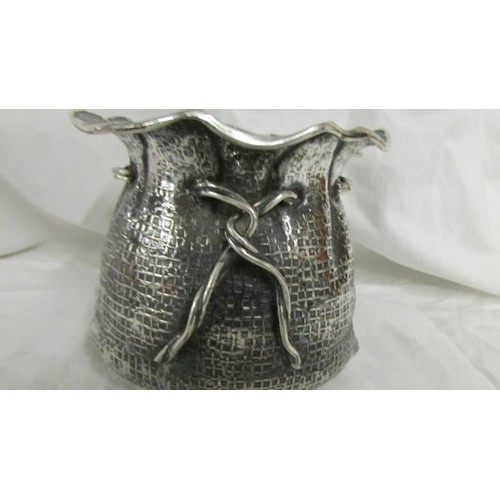 1179 - A silver sack shaped sugar bowl with silver spoon. 290 grams.