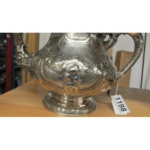 1198 - A good quality silver plate teapot (hinge needs repair).