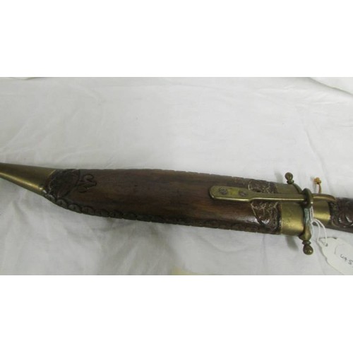 1200 - A dagger in a wooden sheath.