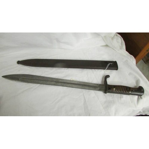 1202 - A Bayonet in sheath marked DUFKOFP WERKE AG.