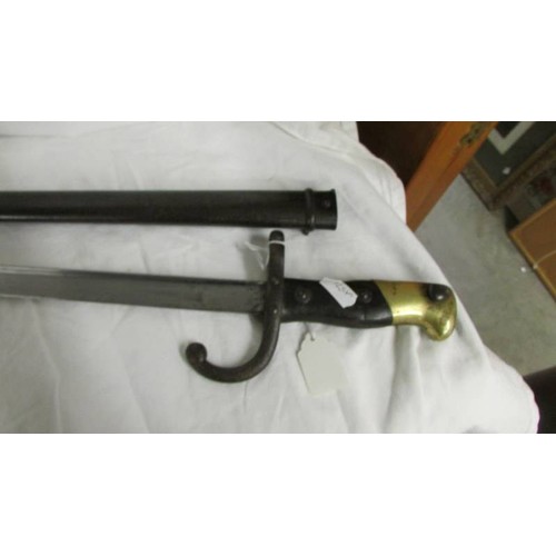 1204 - A Bayonet in sheath marked 54065?