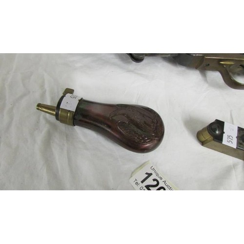 1208 - A replica navy colt, a replica army colt, a bullet mould and a powder flask (Italian Replica's?).