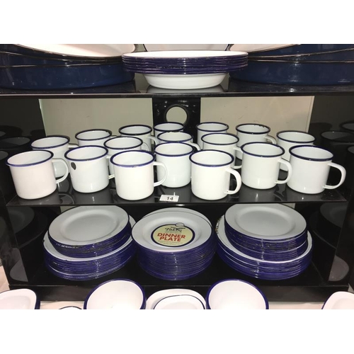 14 - A large quantity of blue and white Falcon enamel dinner ware including mugs, plates etc.