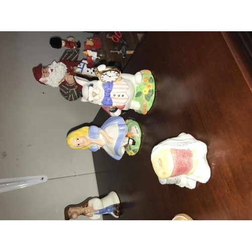 17 - A selection of novelty salt and pepper including Disney, Beatrix Potter etc.