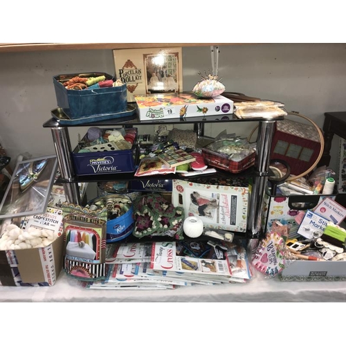 19 - A fabulous lot of sewing equipment, buttons, cotton, tapestry wool, a number of cross stitches new i... 