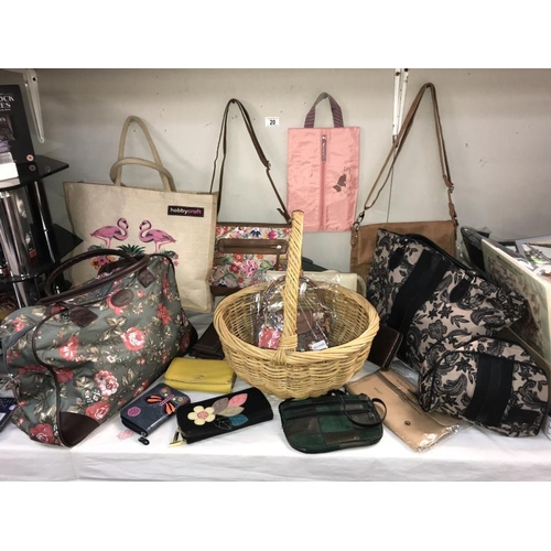 20 - A good selection of ladies bags and purses, includes wicker basket, Cotton Trader, Hobby Craft, Radl... 