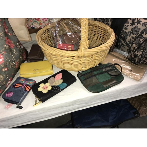 20 - A good selection of ladies bags and purses, includes wicker basket, Cotton Trader, Hobby Craft, Radl... 