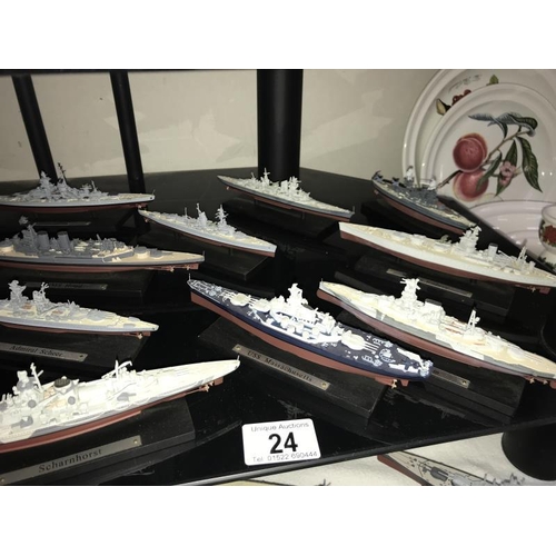 24 - A good selection of plastic/resin model battleships