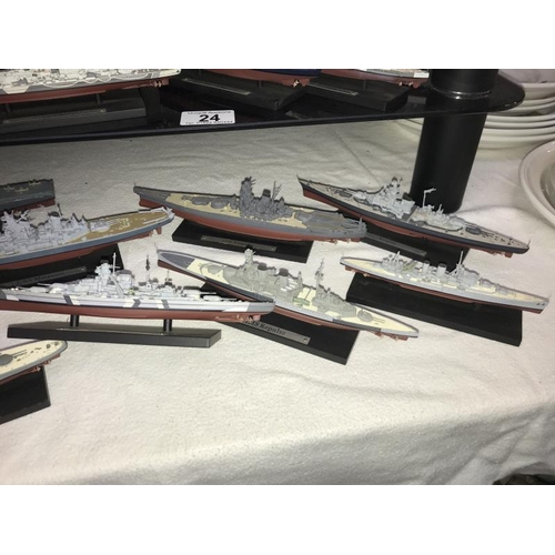 24 - A good selection of plastic/resin model battleships