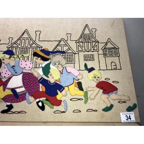 34 - A large felt patchwork of the Pied Piper of Hamelin 74cm x 36cm  COLLECT ONLY