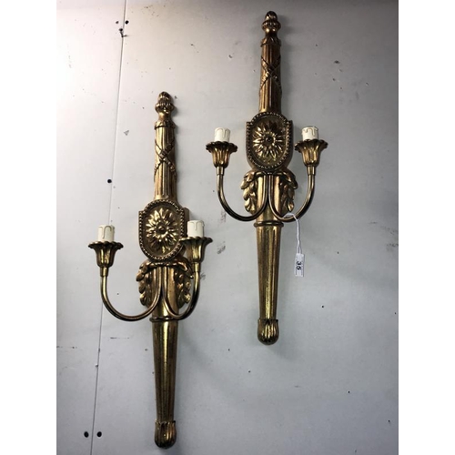 35 - A pair of resin double lamp wall lights in good condition, Length 69cm COLLECT ONLY