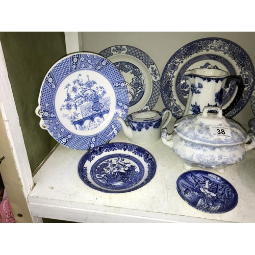 38 - A mixed lot of blue and white plates, jug, sauce tureen etc.