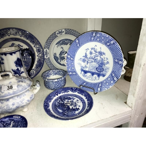 38 - A mixed lot of blue and white plates, jug, sauce tureen etc.