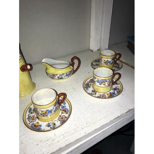 40 - A vintage 15 piece coffee set (coffee pot missing wooden part of handle)  Collect only.