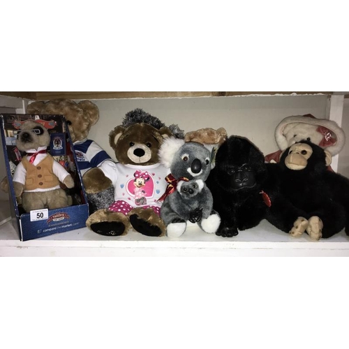 50 - A quantity of soft toys, including gorilla, monkey, boxed Meerkat  etc.