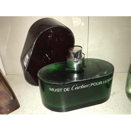 64 - A large Cartier Must De Pour Homme perfumery/chemist shop display bottle, size 24cm x 14.5cm x heigh... 