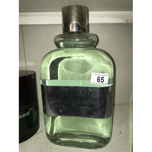 65 - A large Givenchy Gentleman Eau De Toilette perfumery/chemist shop display bottle, height 34cm, (the ... 