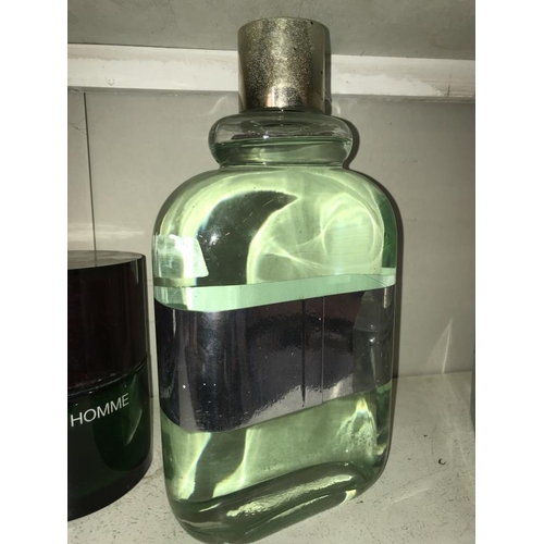 65 - A large Givenchy Gentleman Eau De Toilette perfumery/chemist shop display bottle, height 34cm, (the ... 