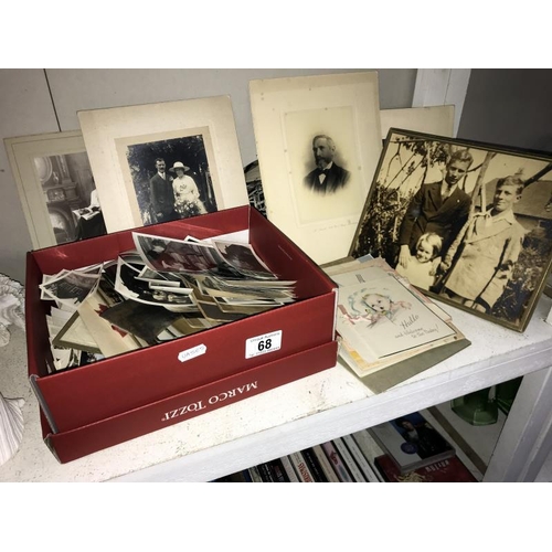 68 - A good quantity of vintage black and white photographs includes birthday cards, anniversary cards et... 