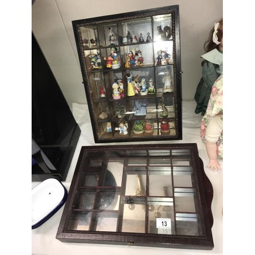 13 - 2 dark wood mirror backed small compartment trinket display cabinets and contents including Wade, Di... 