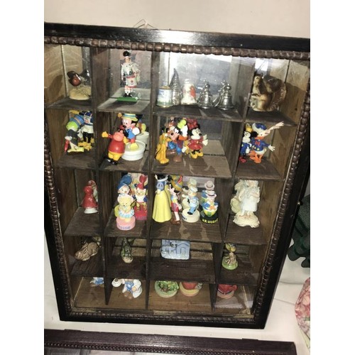 13 - 2 dark wood mirror backed small compartment trinket display cabinets and contents including Wade, Di... 