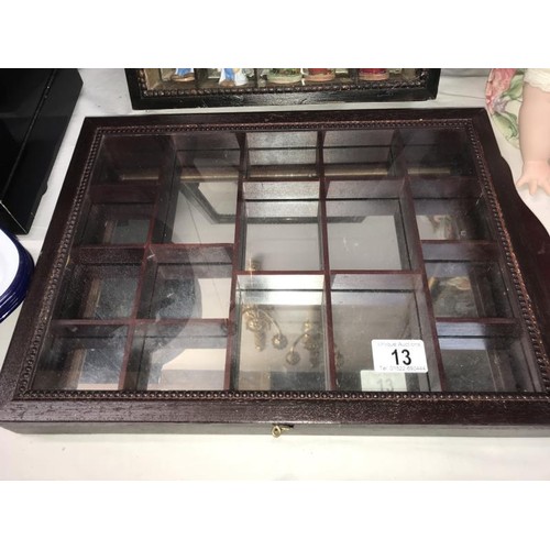 13 - 2 dark wood mirror backed small compartment trinket display cabinets and contents including Wade, Di... 