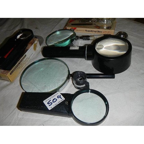 509 - Six good magnifying glasses.