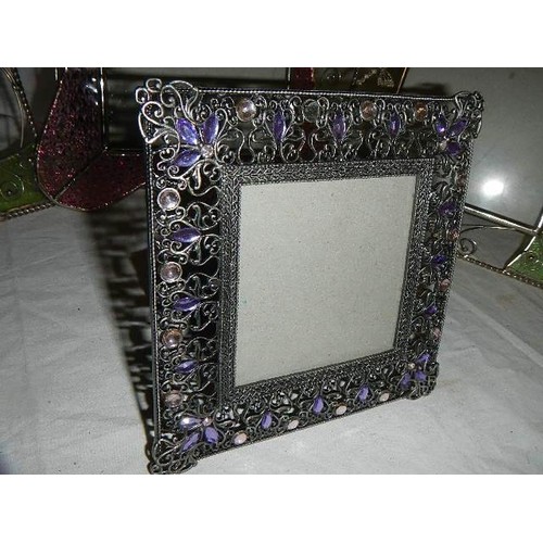 513 - Four good glass and metal photograph frames.