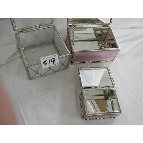 519 - Three glass jewellery boxes.