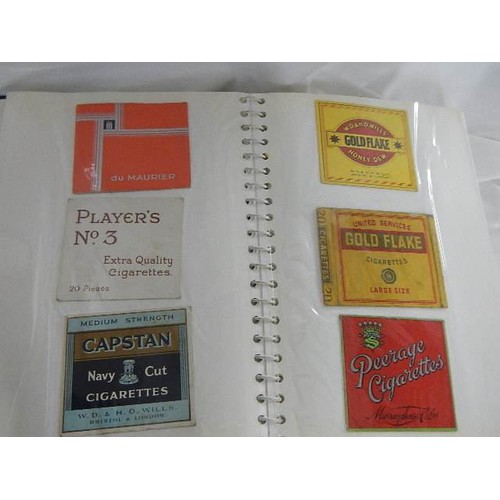 521 - Approximately 90 cigarette box labels.