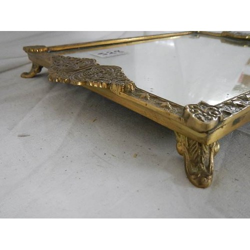 528 - A solid brass two handled tray.