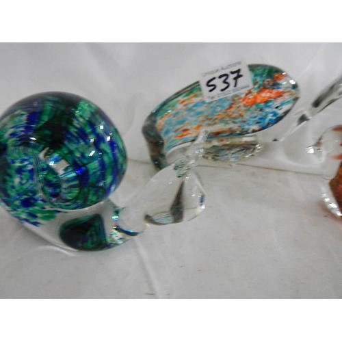 537 - Four unusual glass paperweights.