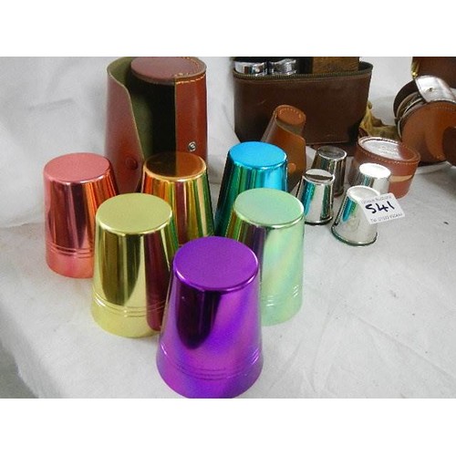 541 - A quantity of leather cased drinking sets, vanity sets etc.,