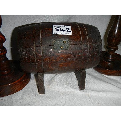 542 - Two pairs of wooden candlesticks and a barrel shaped box.