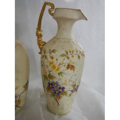 550 - Three Victorian china vases/ewers.