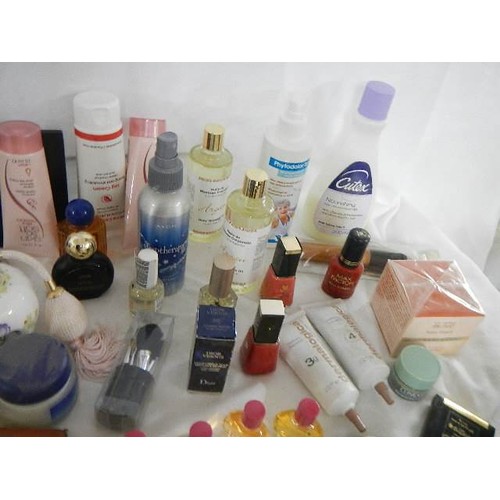 551 - A mixed lot of toiletries etc., (some bottles empty)