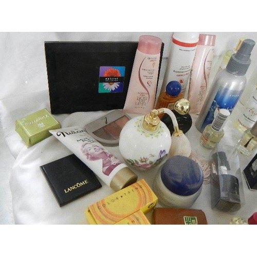 551 - A mixed lot of toiletries etc., (some bottles empty)