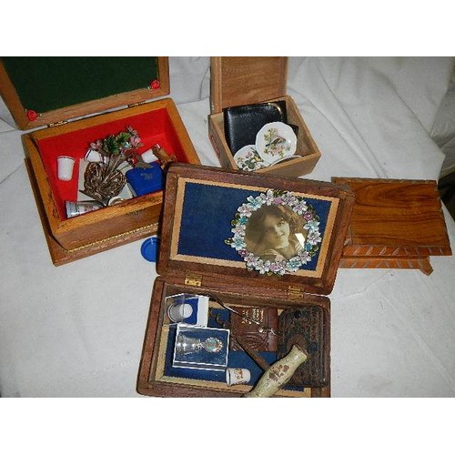 554 - Four old wooden boxes and contents.