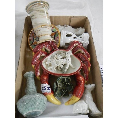 555 - A mixed lot including majolic crab dish, dog etc.,