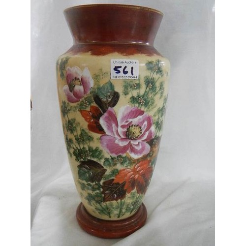 561 - A 35 cm tall Victorian hand painted glass vase.