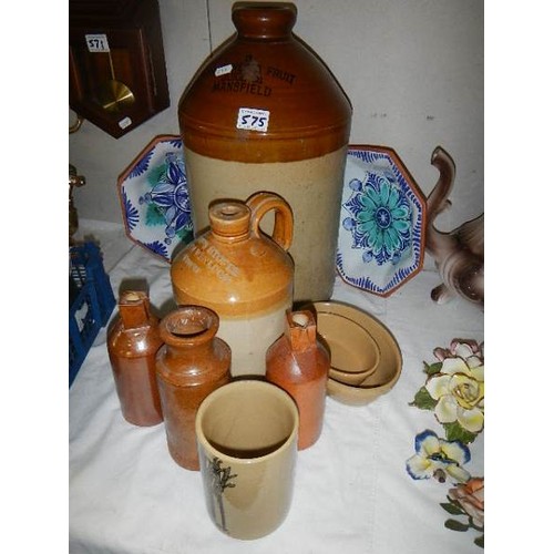 575 - A quantity of earthenware pots and jars.