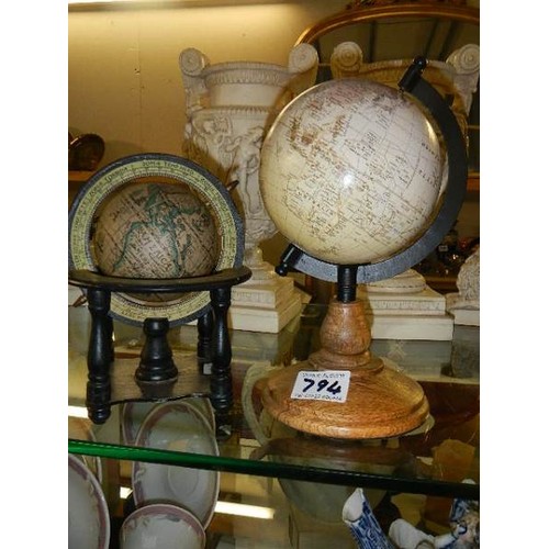 794 - Two world globes.