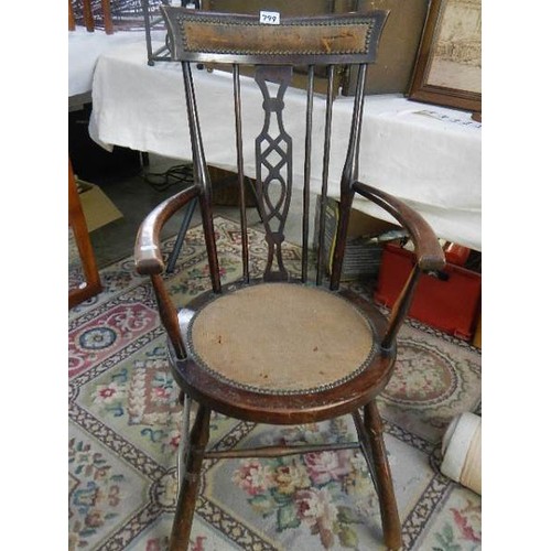 799 - An Edwardian chair (missing one spindle).